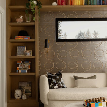 Media Room Lounge with Built-in Shelving and Wallpaper