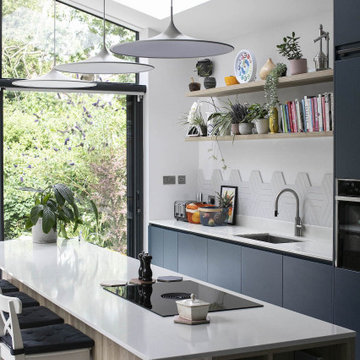 Matt blue and oak handleless kitchen
