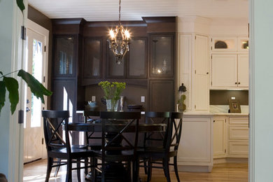Elegant u-shaped eat-in kitchen photo in San Francisco with an undermount sink, beaded inset cabinets, stainless steel cabinets, marble countertops, white backsplash, stone slab backsplash and stainless steel appliances