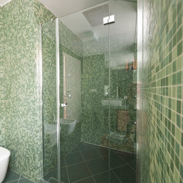 Green glass tiles modern bathroom