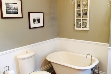 Bathroom - mid-sized traditional white tile and subway tile dark wood floor bathroom idea in Other with shaker cabinets, white cabinets, a one-piece toilet, gray walls and a wall-mount sink