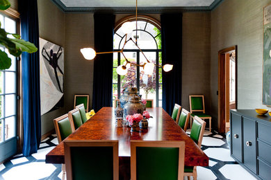 This is an example of a contemporary separate dining room in San Francisco with brown walls and painted wood floors.