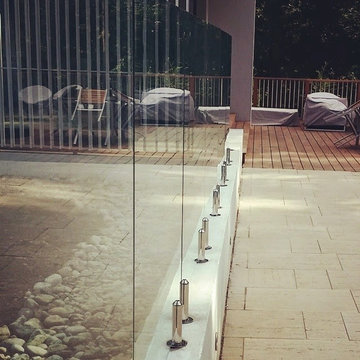 Glass pool fences