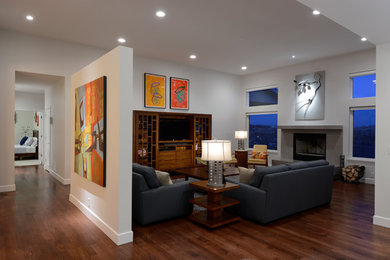 Photo of a large contemporary formal open concept living room in Denver with grey walls, dark hardwood floors, a standard fireplace and a tile fireplace surround.