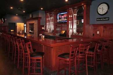 Home bar - large contemporary home bar idea in Chicago