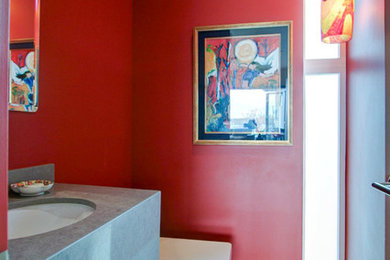 Example of a trendy powder room design in Denver