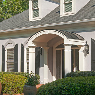 Two column arched portico with gable roof located in Marietta, GA
