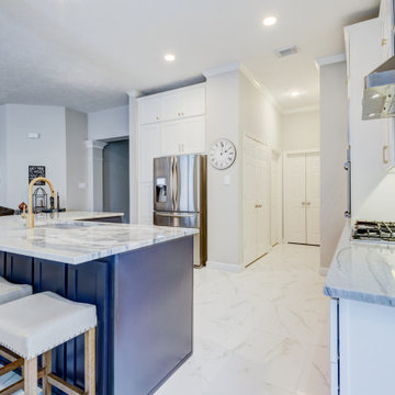 White, blue, gold kitchen