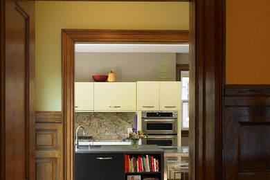 Hallway - mid-sized transitional medium tone wood floor hallway idea in Chicago