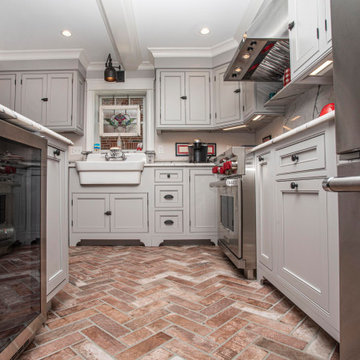 Custom kitchen, dining room, entertainment center and laundry.