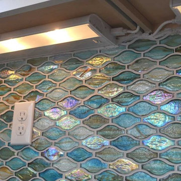 Kitchen Remodel in the Waves. Custom lighting under cabinetry.