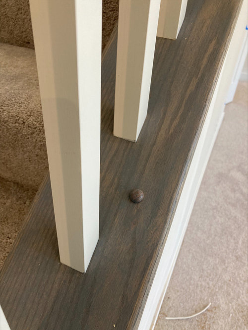 Do my new hardwood floors need to match stair railing & posts stain?