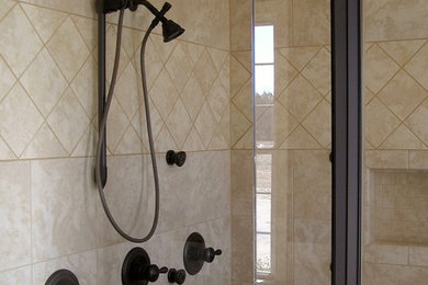 Inspiration for a mid-sized timeless 3/4 beige tile and ceramic tile ceramic tile bathroom remodel in Raleigh with beige cabinets, a one-piece toilet, gray walls, a drop-in sink and solid surface countertops
