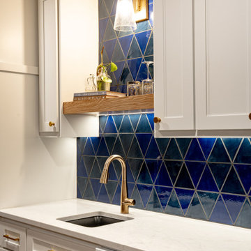 Bold Basement Finish — Linear Gas Fireplace, Wet Bar & Cafe Appliance Suite