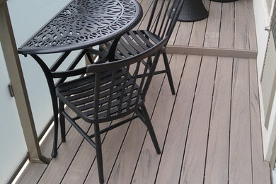 Example of a mid-sized trendy balcony design in Toronto