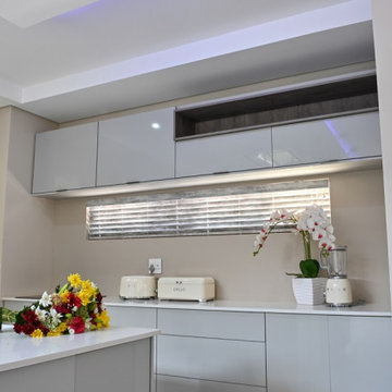 Modern High Gloss Grey toned Streamlined Kitchen