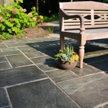 Unilock - Paver patio by Unilock with Rivenstone