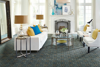 Example of a large transitional formal and enclosed carpeted and blue floor living room design in Orlando with white walls, a standard fireplace, a plaster fireplace and no tv
