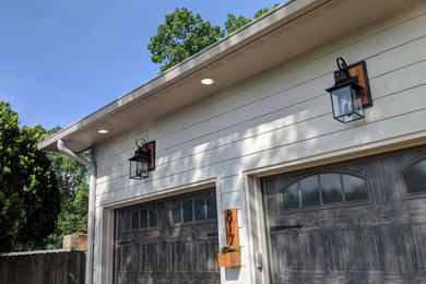 Garage - cottage garage idea in Other
