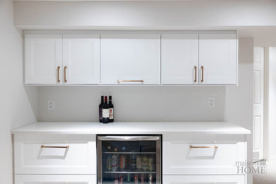 Example of a minimalist home bar design in Other