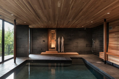 Trendy indoor rectangular pool photo in Portland