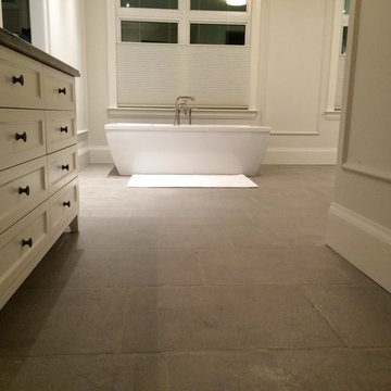 Master Bathroom with Grey Barr Reedition French Limestone Floors