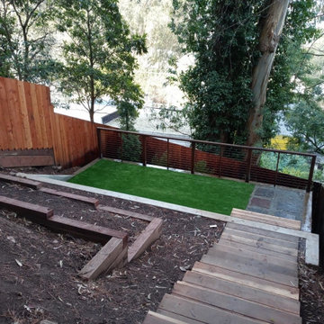 A Steeply Sloped Backyard is Transformed Into a Multi-Level Entertainment Venue