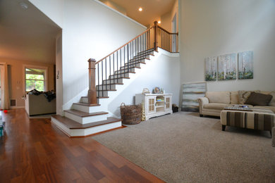 Staircase - mid-sized modern wooden straight wood railing staircase idea in Portland with painted risers