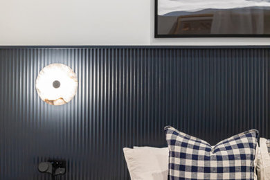 This is an example of a small transitional master bedroom in Adelaide with blue walls.