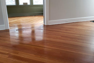 This is an example of a small traditional formal enclosed living room in New York with medium hardwood floors.