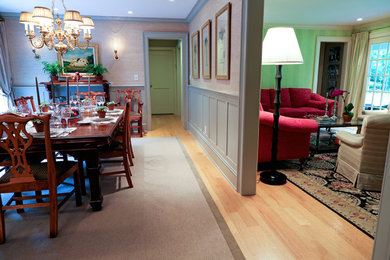Example of a mid-sized transitional light wood floor and beige floor enclosed dining room design in New York with beige walls and no fireplace