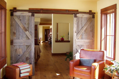 Mid-sized cottage light wood floor sunroom photo in Other