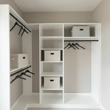 Double‑Hang Closet Section with Central Shelving Tower