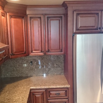 Craftsman Cherry Cabinet w/Rope Detail, Oven Hood Vent, w/Crown Moulding & Grani