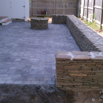 stone wall patio and fire pit