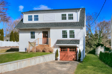Example of a cottage exterior home design in New York