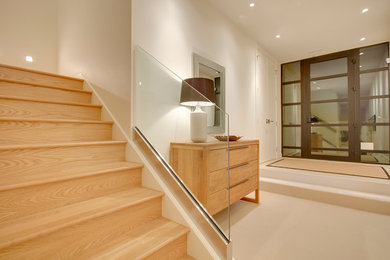 Inspiration for a modern entryway remodel in Calgary