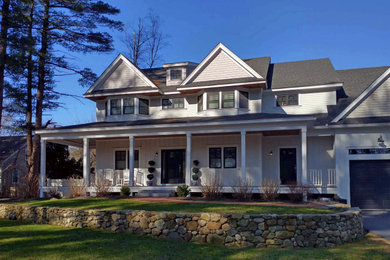 Example of a cottage exterior home design in Boston