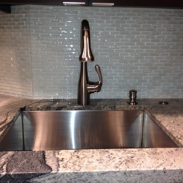 Single sink with pull-down faucet and soap dispenser