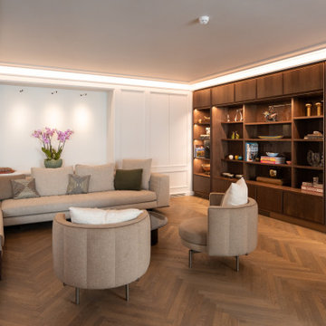 Elegant living room with bespoke wood cabinetry, and layered KNX smart lighting.