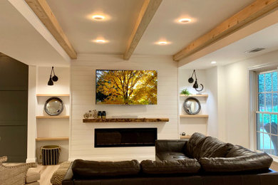 Inspiration for a large craftsman walk-out basement remodel in Atlanta with white walls