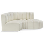 Meridian Furniture - Arc Vegan Leather Upholstered 3-Pc. S-Shaped Modular Sofa, Cream - Unleash modern opulence with the Arc Vegan Leather 3pc. Sectional. Crafted for the modern connoisseur, this Sectional injects an air of refined luxury into any space. Its sleek silhouette, upholstered in supple cream vegan leather, exudes timeless sophistication while the deep channel tufting adds textural intrigue, further elevating the chair's visual appeal. The modular design makes it a versatile chameleon, effortlessly adapting to your evolving needs and preferences. Whether you envision it gracing a chic living room corner, basking in the glow of a bedroom window, or adding a touch of drama to a home office, the Arc seamlessly complements your unique interior aesthetic.
