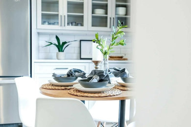 Example of a transitional kitchen design in Toronto