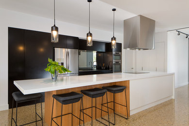 Modern galley kitchen in Melbourne with with island.