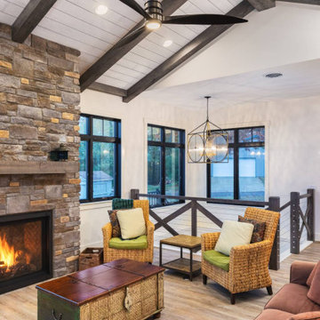 Elegant Farmhouse Interior with Rustic Mantle on Fireplace