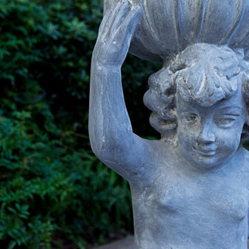 Kneeling Cherub Urn