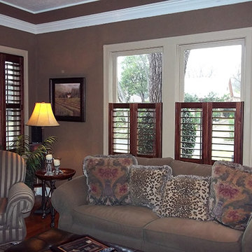 Stained Shutters on White Casement Windows