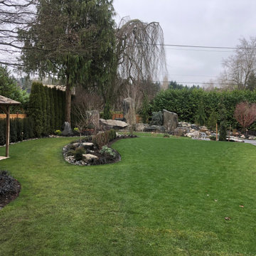 Bocce Ball Court, Pond, Granite Rocks and Dimensonal Flagstone