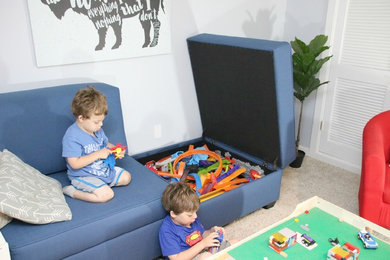 Basement - mid-sized modern carpeted basement idea in Orange County with white walls