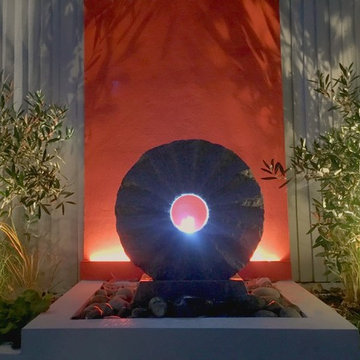 The water feature and lighting is operated by remote control to give flexibility